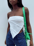 Front view of model wearing  front Princess Polly Sleeveless Asymmetric Neckline  Sylvia Strapless Top White