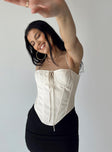 side view of model wearing Princess Polly Del Gato Corset Top Off White Sleeveless Square Neck 