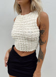 Front view of model wearing  front Princess Polly Sleeveless Crew Neck  Kendrick Top Cream