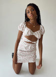 Front view of model wearing  front Princess Polly Square Neck  Nakita Mini Dress White Floral