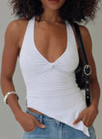 front view of model wearing Princess Polly Chilli Halter Top White Sleeveless Plunger 