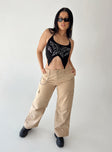 Front view of model wearing  front Princess Polly  Fallout Mid Rise Cargo Pants Beige