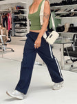 Front view of model wearing  front Princess Polly High Waisted Pants  Cayman Pants Deep Navy / White