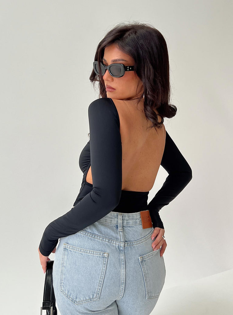 back view of model wearing Princess Polly Gatewood Long Sleeve Bodysuit Black Petite Full Sleeves Boat Neck 