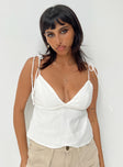 front view of model wearing Princess Polly Brearley Top White Sleeveless Plunger 