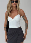 front view of model wearing Princess Polly Sampson Top White Sleeveless V-Neck 