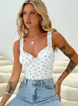 front view of model wearing Princess Polly Lupton Bodysuit White / Blue Floral Sleeveless 