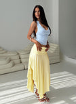   side view of model wearing Princess Polly Symphonia Asymmetrical Midi Skirt Butter Yellow Midi Skirts 