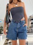 back view of model wearing Princess Polly Lou Carpenter Denim Shorts Mid Wash High Waisted Shorts 