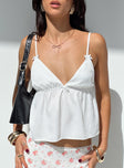 front view of model wearing Princess Polly Missoura Top White Sleeveless V-Neck 