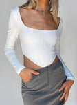 Front view of model wearing  front Princess Polly Full Sleeves Square Neck  Kaeshia Rib Long Sleeve Bustier White