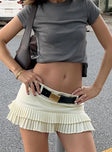 front view of model wearing Princess Polly Deei Double Ruffle Mini Skort Soft Lemon Low Rise Shorts 