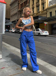 Front view of model wearing  front Princess Polly Low Rise Jeans  Miami Vice Pants Blue