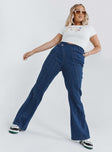 front view of model wearing Princess Polly Odette Flare Denim Jeans Blue High Waisted 