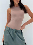 front view of model wearing Princess Polly Crespi Bodysuit Beige Sleeveless Crew Neck 