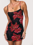 side view of model wearing Princess Polly Kellers Mini Dress Black / Floral Square Neck 