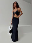   side view of model wearing Princess Polly Nesting Maxi Skirt Black Maxi 