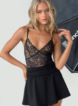 front view of model wearing Princess Polly Enchanta Lace Bodysuit Black Sleeveless Plunger 