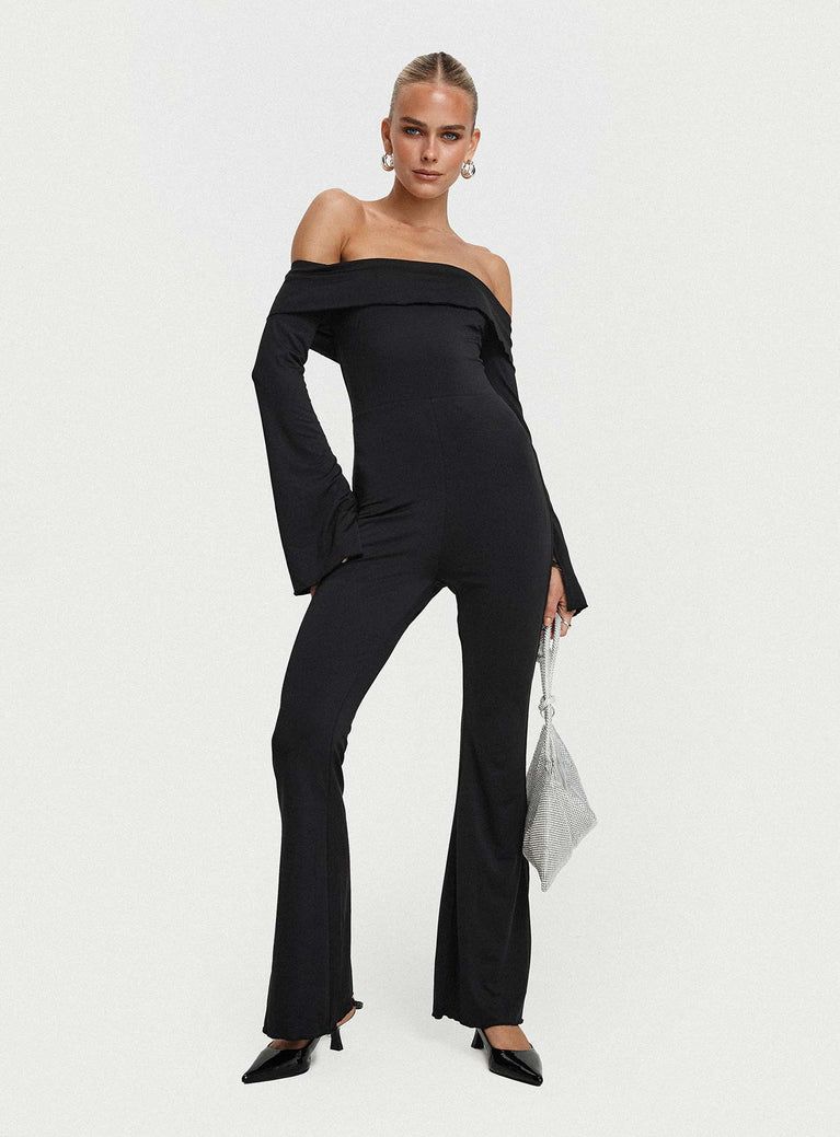 Jumpsuit Off-the-shoulder style, inner silicone strip at bust, flared sleeves with split, frill detail at bust, flared leg Good stretch, fully lined  Princess Polly Lower Impact 