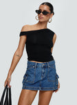   side view of model wearing Princess Polly Pacific Coast Denim Cargo Skirt Dark Wash Mini Skirts 