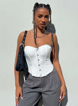 Front view of model wearing  front Princess Polly Sleeveless Sweetheart  In The Moment Strapless Top White