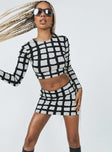   front view of model wearing Princess Polly Motel Ima Skirt Mesh Mono Painted Check Black Mini Skirts 