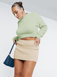   side view of model wearing Princess Polly Lorentz Mini Skirt Beige Mini Skirts 