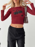 Front view of model wearing  front Princess Polly Full Sleeves Square Neck  Amabon Cherry Print Long Sleeve Top Adrenalin Red