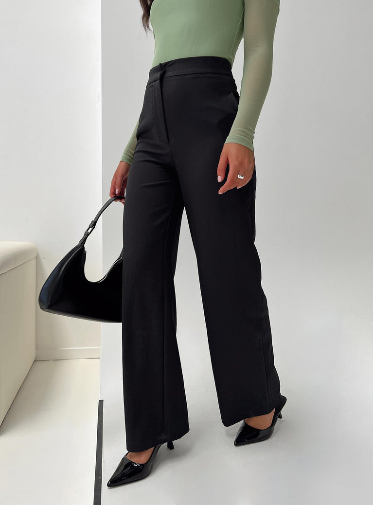 front view of model wearing Princess Polly Burnette Pants Black Tall High Waisted Pants 