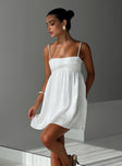 side view of model wearing Princess Polly Ortega Mini Dress White Petite Square Neck 