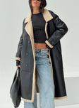 Longline coat Lapel collar, long sleeves, shearling cuffs & detail, single button fastening at cuff, twin hip pockets, double-breasted front 