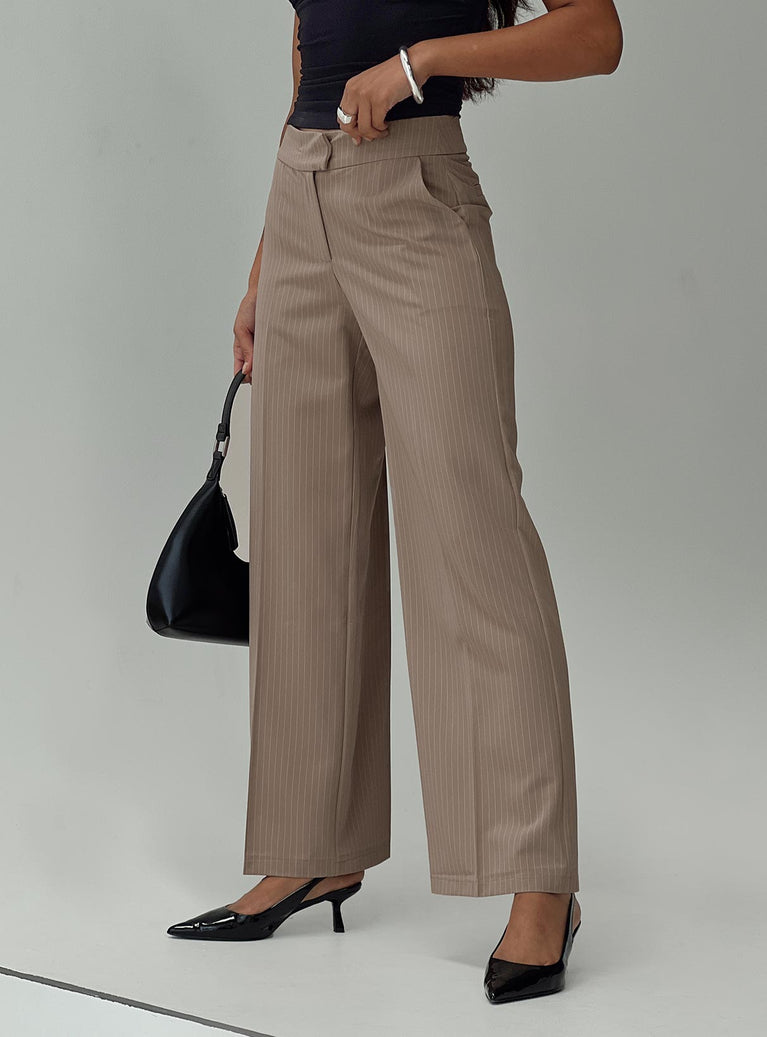 side view of model wearing Princess Polly Jeller Pinstripe Pants Beige Pinstripe High Waisted Pants 