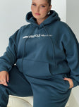 front view of model wearing Princess Polly Princess Polly Hooded Sweatshirt Block / Cursive Text Slate Curve 