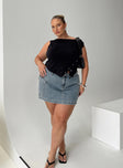   side view of model wearing Princess Polly Zakai Cargo Denim Mini Skirt Light Blue Denim Curve Mini Skirts 