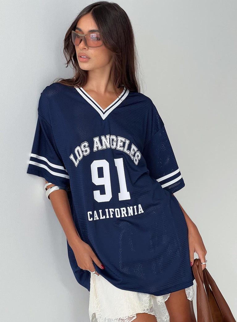 side view of model wearing Princess Polly Michail Jersey Dress Navy V-Neck 