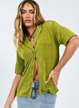 Front view of model wearing  front Princess Polly Half Sleeves High Neck  Misha Shirt Green