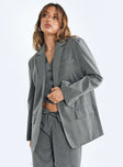 Blazer Pinstripe print Lapel collar Button fastening at front Faux chest pocket Twin front pockets Split at back