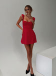 side view of model wearing Princess Polly Landon Mini Dress Red Petite Sweetheart Neckline 