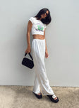 Front view of model wearing  front Princess Polly High Waisted Pants  Nixie Pants White