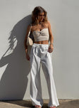 Front view of model wearing  front Princess Polly High Waisted Pants  Brunie Pants White Tall