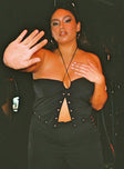 front view of model wearing Princess Polly Rhythm Stud Top Black Curve 