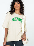 Front view of model wearing  front Princess Polly Half Sleeves Crew Neck  Mexico Graphic Tee Off White