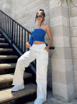 Front view of model wearing  front Princess Polly Low Rise Pants  Fallout Mid Rise Cargo Pants White Petite