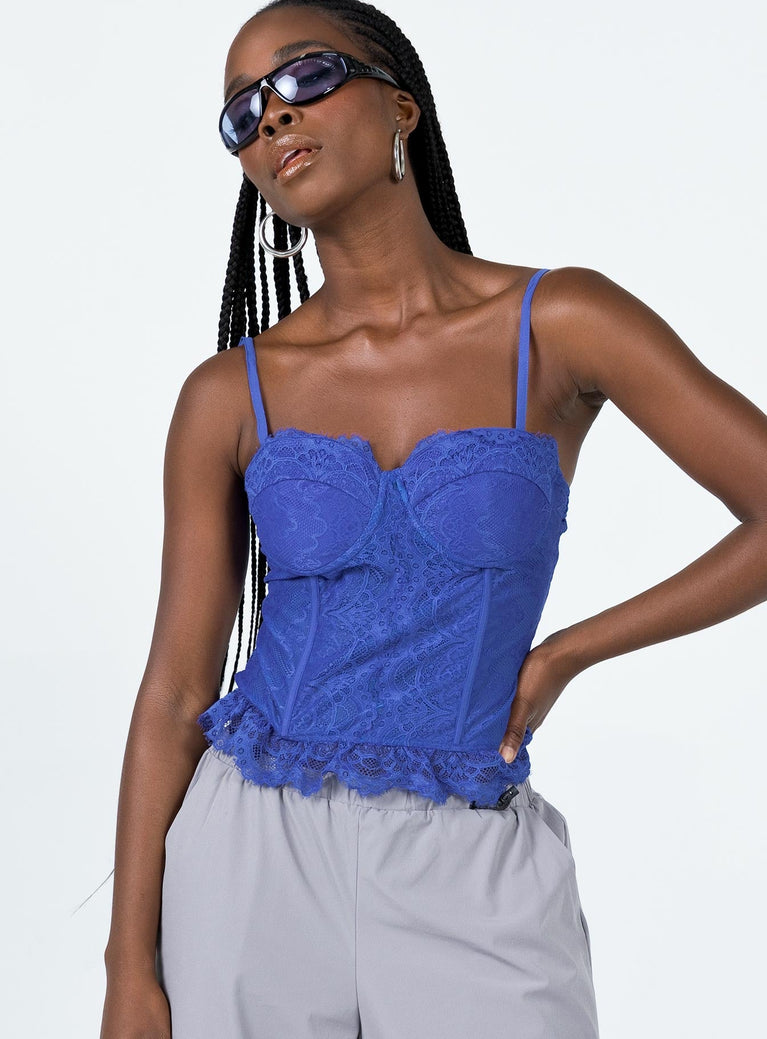 Front view of model wearing  front Princess Polly Sleeveless Sweetheart  Balfour Corset Top Blue