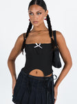 Front view of model wearing  front Princess Polly Sleeveless Square Neck  Revonda Corset Top Black