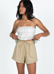 Front view of model wearing  front Basils Shorts Beige Princess Polly High Waisted Shorts 