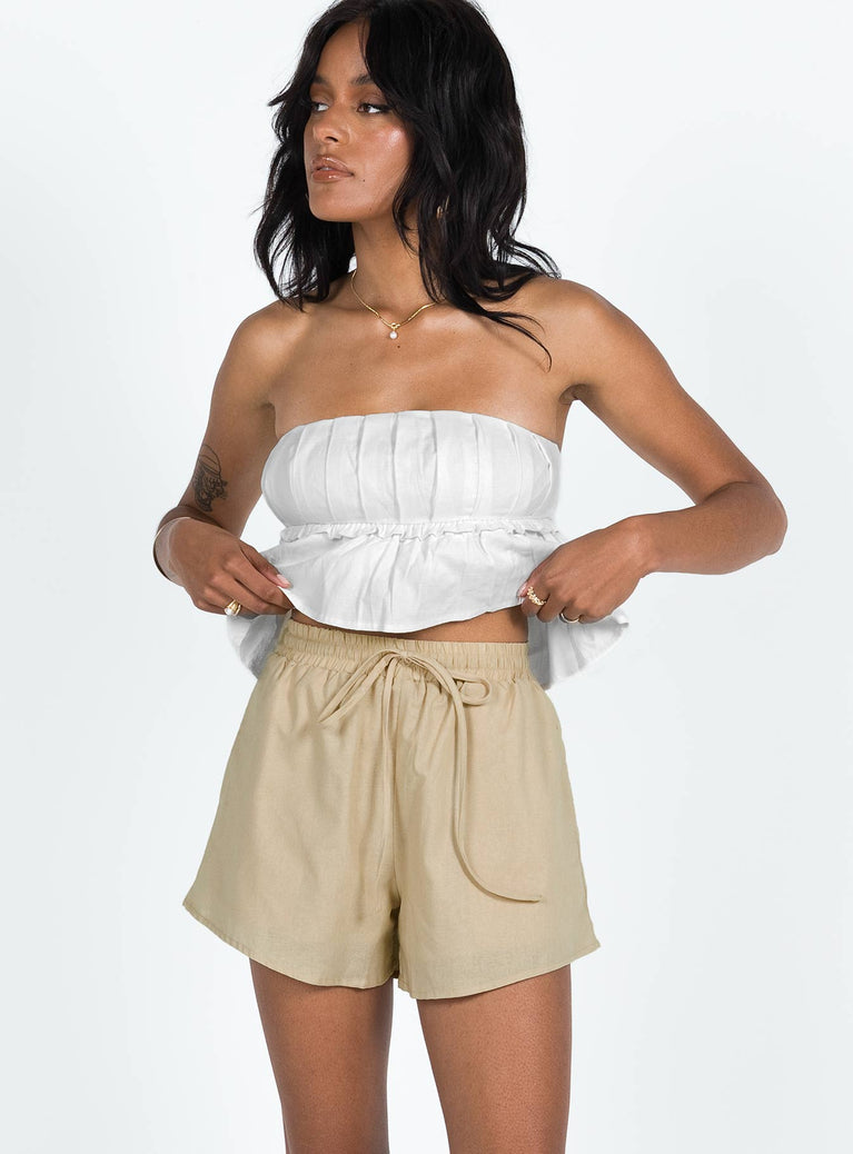 Front view of model wearing  front Basils Shorts Beige Princess Polly High Waisted Shorts 