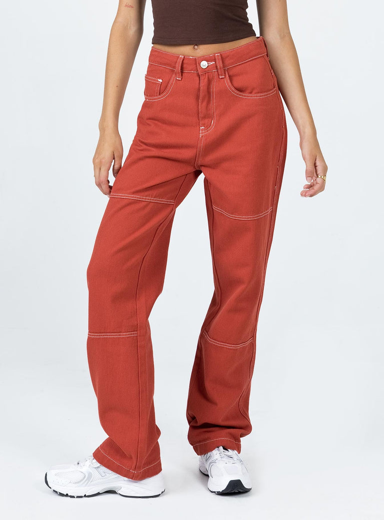 Front view of model wearing  front Princess Polly Mid Rise  Copeland Jeans Red