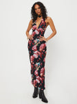 Front view of model wearing  front Princess Polly Square Neck  Moulin Halter Maxi Dress Black / Red Floral