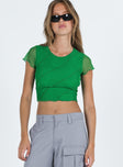 Front view of model wearing  front Princess Polly Short Sleeves Square Neck  Mateo Top Green